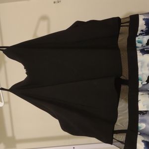 Prom dress with floral design and mesh over the stomach